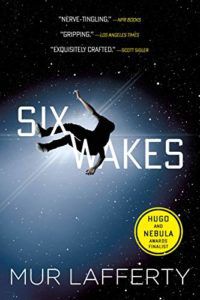 Book cover of Six Wakes by Mur Lafferty, showing a person falling through a night sky